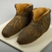 Hubert's slippers, <a href="https://www.canterbury-cathedral.org/whats-on/news/2015/07/16/the-vestments-of-hubert-walter/"target="_blank">Canterbury Cathedral</a>; 12th century; EXH68: Hubert's slippers