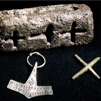 Casting mold for 2 crosses and Thor's Hammer, <a href="https://samlinger.natmus.dk/hvorerdetfra?q=Trendg%C3%A5rden&include-discarded=false"target="_blank">National Museum of Denmark, C24451</a>; 10th century; EXH40: C24451