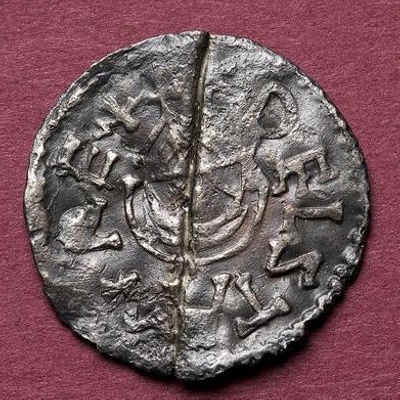 Coin of East Anglian King Æthelstan with ship on obverse, Norwich Castle Museum, 1978.423



; 10th c.; England; EXH96: NWHCM 1978.423