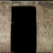 The mural on the west wall of Yulin Cave 3, showing Manjusri, with the image of Xuanzang at the top left. 