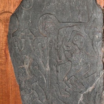 Thorwald's Cross Slab showing Odin (Woden) and Christian Symbolism, <a href="https://isleofmanher.im/report/11ec477d-4d0c-483a-9906-e22b1067620d"target="_blank">Isle of Man Heritage, Manx Cross/Andreas 128</a>; 10th century; EXH42: Manx Cross/Andreas 128
