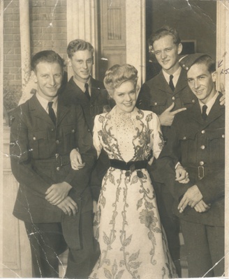 Four RAF cadets with Hollywood Star Alice Faye - 1942; 84037