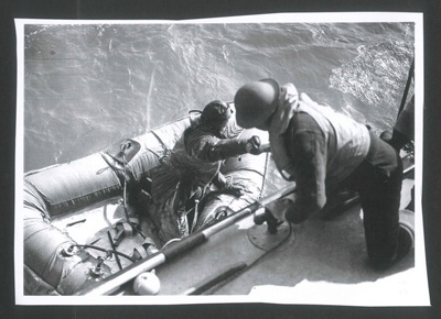 Copies (2) of photograph - R.A.F. air/sea rescue section rescuing airman in distress (with legend); 34364 Copies (2) of photograph - R.A.F. air/sea rescue section rescuing airman in distress (with legend); 34364