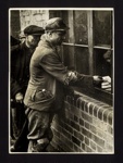 Photograph - "Amenities for miners" - miner clocking record of day's output; 6125