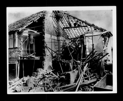 Official copyrighted war photograph- 20th June 1940- close up of wrecked house in the South of England; 56526