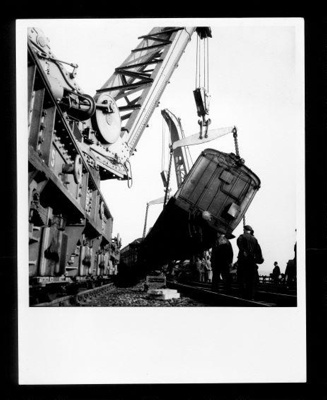 Official copyrighted war photograph- 20th October 1940- clearning debris from damaged train after bombing raid; 56521