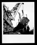 Official copyrighted war photograph- 20th October 1940- clearning debris from damaged train after bombing raid; 56521
