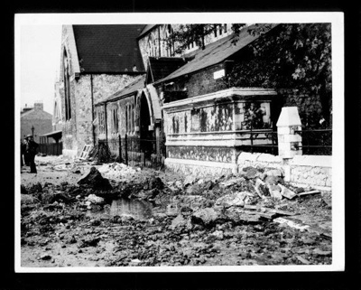 Official copyrighted war photograph- 8th September 1940- damaged church and bomb crater in South London; 56486