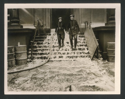 Official copyrighted war photograph- 9th September 1940 -firemen at work in London; 56537