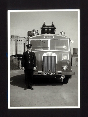 Photograph - "Dennis" fire engine (kvn 344) with chief fireman; 6711 Photograph - "Dennis" fire engine (kvn 344) with chief fireman; 6711