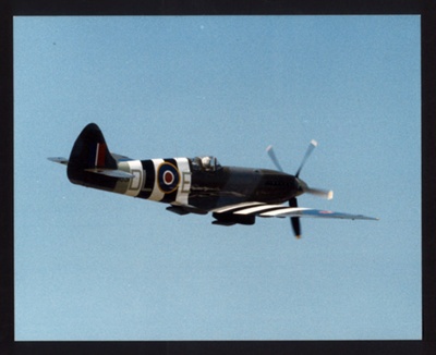 Photograph (colour) - Spitfire MK IXX PM631 - R.A.F. 54 squadron - in D-day markings - Cranfield College of Aeronautics; 6346 Photograph (colour) - Spitfire MK IXX PM631 - R.A.F. 54 squadron - in D-day markings - Cranfield College of Aeronautics; 6346
