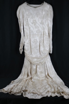 1948 Ivory jacquard satin wedding dress & underslip. Worn by donator's aunt; 74800