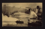 Press photograph - A.F.S. fire vessels fighting wharfside fires in East Ham - with original text; 6715