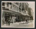 Official copyrighted war photograph- 18th Septemebr 1940- clearing debris from damaged shop windows in London's West End; 56532