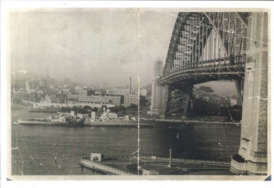 Copy of photograph - "H.M.S. Black Prince" - Dido class cruiser - passing under Sydney harbour bridge - Australia; 35999