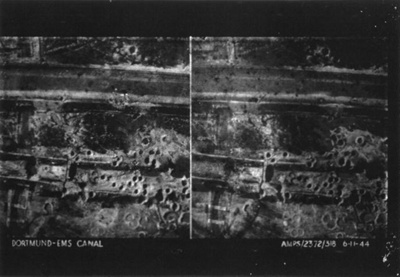 R.A.F. photograph transparency - Bomb Damage at Dortmund-ems Canal - 06/11/1944; 6/11/1944; 9012 R.A.F. photograph transparency - Bomb Damage at Dortmund-ems Canal - 06/11/1944; 6/11/1944; 9012