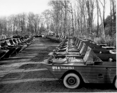 Photograph - U.S. war material for the invasion of Europe - amphibious jeeps parked in rows; 2637