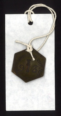 Tally tag (metal) - Dinnington main coal Co. Ltd - no: F 913 - 1944; 1/01/1944; 6136 Tally tag (metal) - Dinnington main coal Co. Ltd - no: F 913 - 1944; 1/01/1944; 6136