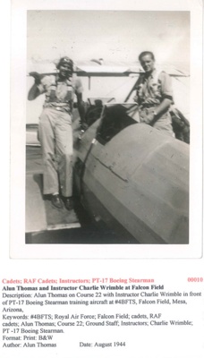 Alun Thomas and Instructor Charlie Wrimble in front of a PT-17 Boeing Stearman Training Aircraft - Course 22 - Falcon Field - August 1944 - Photo No. 00010; 83467