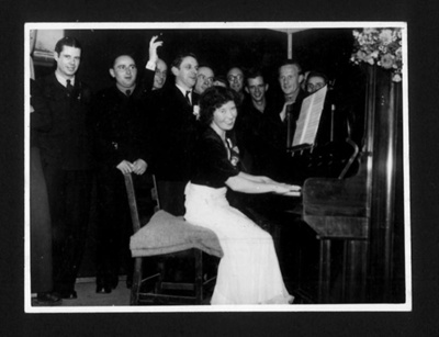 Photographs (7) & Post Card (1) - Winifred Percival Entertaining Italian P.O.W.s 1945-1947 & Italian Chapel - Lamb Holm - Orkney; 1/01/1945; 2356
