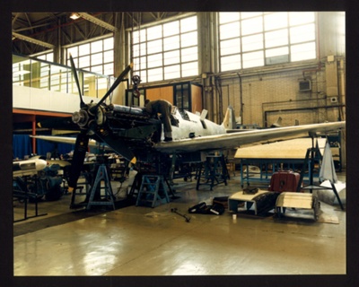 Photograph (colour) - Spitfire MK IXX PM631 - in reconstruction stage - Cranfield College of Aeronautics; 6353
