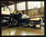 Photograph (colour) - Spitfire MK IXX PM631 - in reconstruction stage - Cranfield College of Aeronautics; 6353 Photograph (colour) - Spitfire MK IXX PM631 - in reconstruction stage - Cranfield College of Aeronautics; 6353