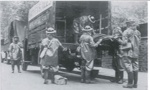 Computer disc - contains photograph of A.R.P gas contamination squad loading stretcher on to Watney's Ales lorry; 35575
