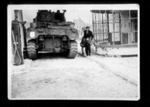Photograph - hertogenBosch, Holland - showing a tank and a father carrying his two children; 42284 Photograph - hertogenBosch, Holland - showing a tank and a father carrying his two children; 42284