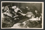 Official copyrighted war photograph- 12th September 1940- Wardens and arp workers asleep in a school room inbetween calls; 56544