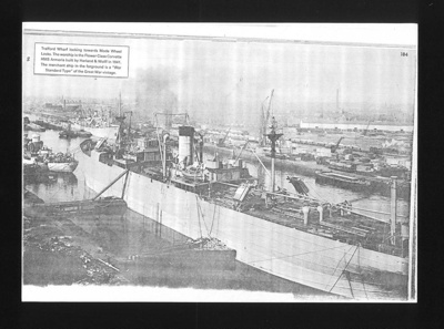 Copies of photographs (2) - D.E.M.S. ships (showing armament) in dock - with "H.M.S. Armeria" - flower class corvette; 1963