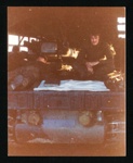 Coloured photograph of CVRT Scimitar 23 C in barn during the Falklands War; 79699