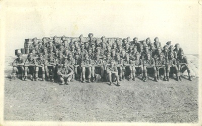 Copies (2) of photograph - 1st Bn Royal Hampshire Regiment - Palestine - 1947 - (John Cockerill front row (seated) 2nd from right); 37891 Copies (2) of photograph - 1st Bn Royal Hampshire Regiment - Palestine - 1947 - (John Cockerill front row (seated) 2nd from right); 37891