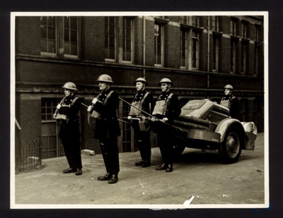 Photograph - A.F.S. firemen (5) with fire tender from East Ham fire brigade; 6710