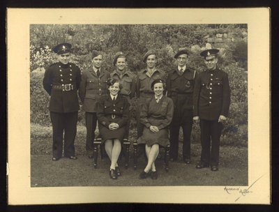 Black & white photograph- family portrait in uniform, R.A.S.C., Fire Service ; 78869 Black & white photograph- family portrait in uniform, R.A.S.C., Fire Service ; 78869