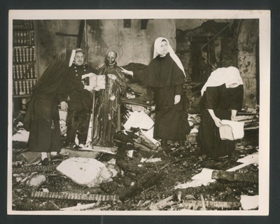 Official copyrighted war photograph- 26th September 1940- nuns inside chapel of damaged convent after bombing raid; 56565