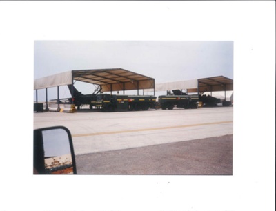 Colour photograph - L. Wainwright refueling a R.A.F. tornado aircraft - dahran - 1990 - (copy in hut 13); 1/01/1990; 35889 Colour photograph - L. Wainwright refueling a R.A.F. tornado aircraft - dahran - 1990 - (copy in hut 13); 1/01/1990; 35889