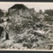 Official copyrighted war photograph- 19th June 1940- bedsteads amongst the debris of demolished house; 56542