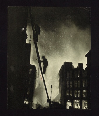 Photograph - firemen climbing ladder into burning bomb damaged building; 6804 Photograph - firemen climbing ladder into burning bomb damaged building; 6804
