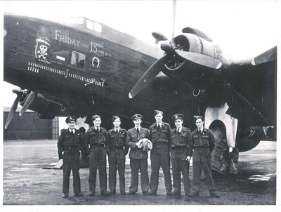 Copy of photograph - 158 squadron R.A.F. Halifax bomber "Friday the 13th" with pilot "Dumbo" Smith and first crew - April 1944 - (copy in hut 26); 1/04/1944; 36810 Copy of photograph - 158 squadron R.A.F. Halifax bomber "Friday the 13th" with pilot "Dumbo" Smith and first crew - April 1944 - (copy in hut 26); 1/04/1944; 36810
