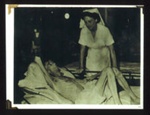 Photograph - nurse with weased P.O.W. from Japanese camp; 16684 Photograph - nurse with weased P.O.W. from Japanese camp; 16684