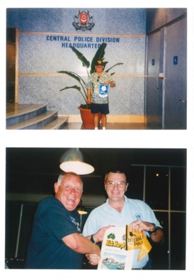 Colour photographs (2) - exchange of pennants - international police Association - Australia 17/06/2001 & Singapore 23/07/2001; 17/06/2001; 37438 Colour photographs (2) - exchange of pennants - international police Association - Australia 17/06/2001 & Singapore 23/07/2001; 17/06/2001; 37438