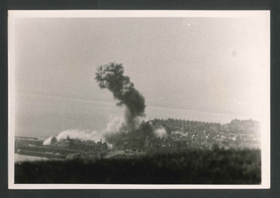 Official copyrighted war photograph- 27th August 1940- bombs bursting over the residential area of folkestone; 56560