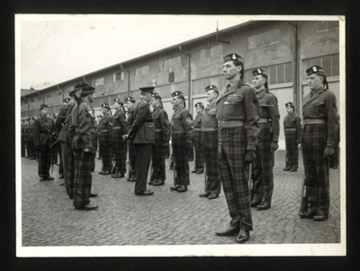 Photo of J.B McFeat + others in uniform R.S.F (Royal Scottish Fusiliers)  Marching, 1950s; 76925