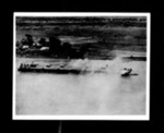 Photograph - R.A.F. Beaufighter attacks oil barge S.W. of Pakokku - Burma; 2634