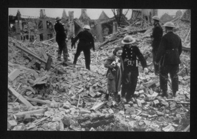 Photograph - firemen surveying bomb damage; 6803 Photograph - firemen surveying bomb damage; 6803