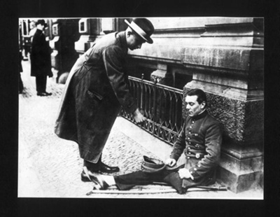 Photograph - a German officer (WW1) reduced to begging in the street after the economic collapse of 1929; 1/01/1929; 8955 Photograph - a German officer (WW1) reduced to begging in the street after the economic collapse of 1929; 1/01/1929; 8955