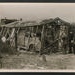 Official copyrighted war photograph- 19th June 1940- wrecked car and garage; 56541
