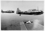 Two AT-6 Harvard/Texan Advanced Trainers in Flight in formation with a third - 1941-45; 84042 Two AT-6 Harvard/Texan Advanced Trainers in Flight in formation with a third - 1941-45; 84042