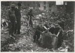 Copied official press photograph - Pioneers clear away debris from air raid in London; 41702