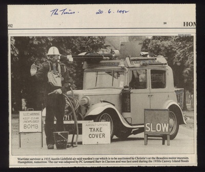 Press cutting - photograph of 1935 Austin Lichfield motor car converted to A.R.P Warden's car; 9780 Press cutting - photograph of 1935 Austin Lichfield motor car converted to A.R.P Warden's car; 9780